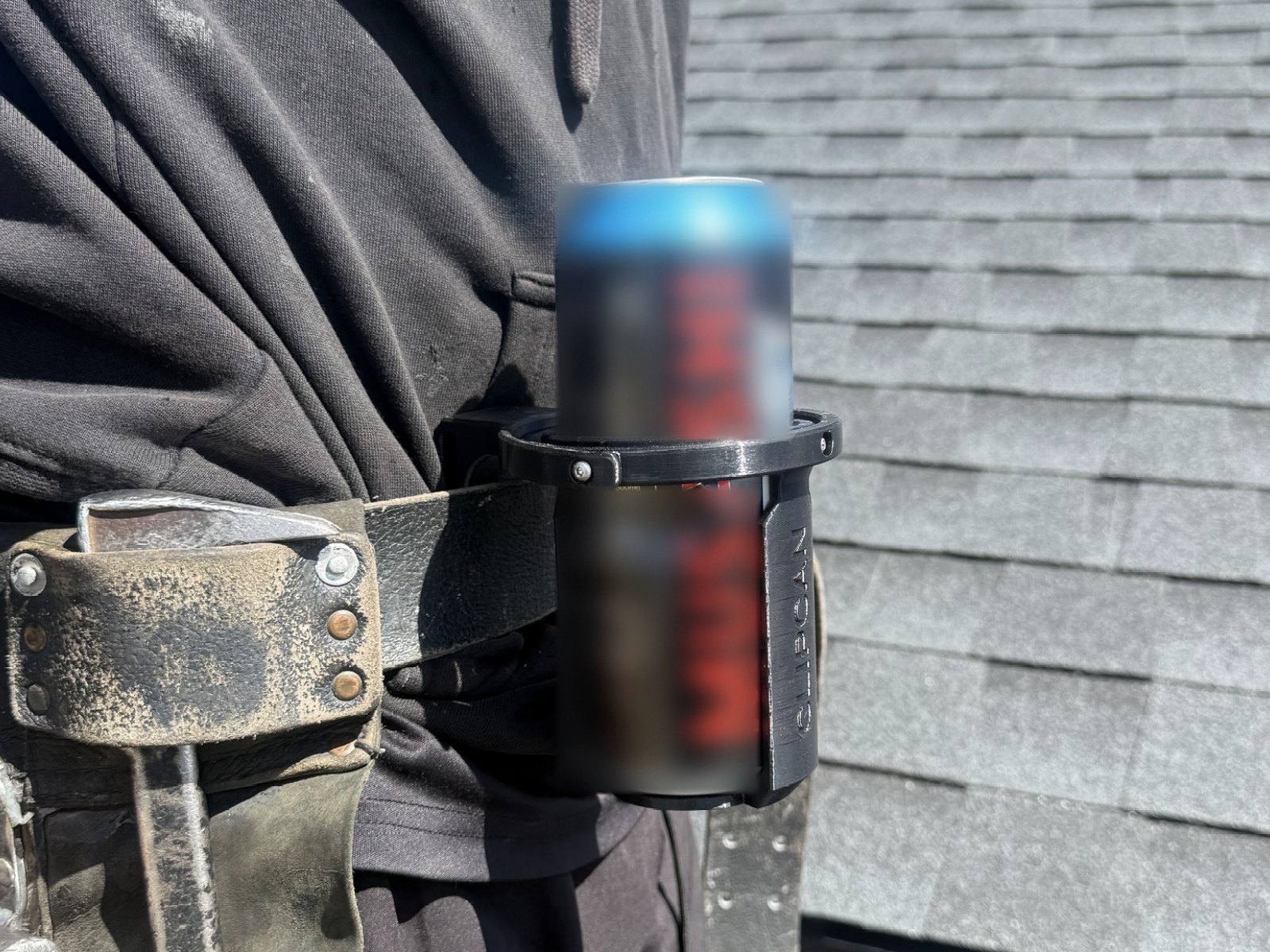 Clipcan Tool Belt on the belt beside a hammer holder